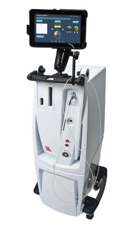 Advanced dental imaging equipment with digital monitor mounted on mobile cart in clinical setting.